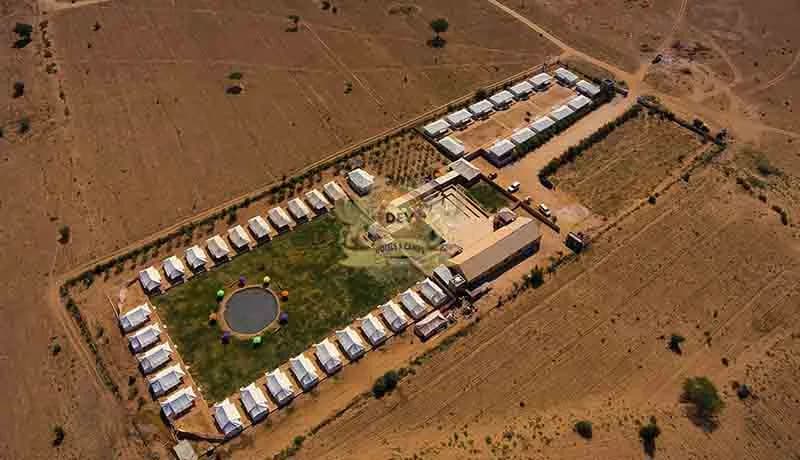 Aerial view of Camp e Khas surrounded by desert